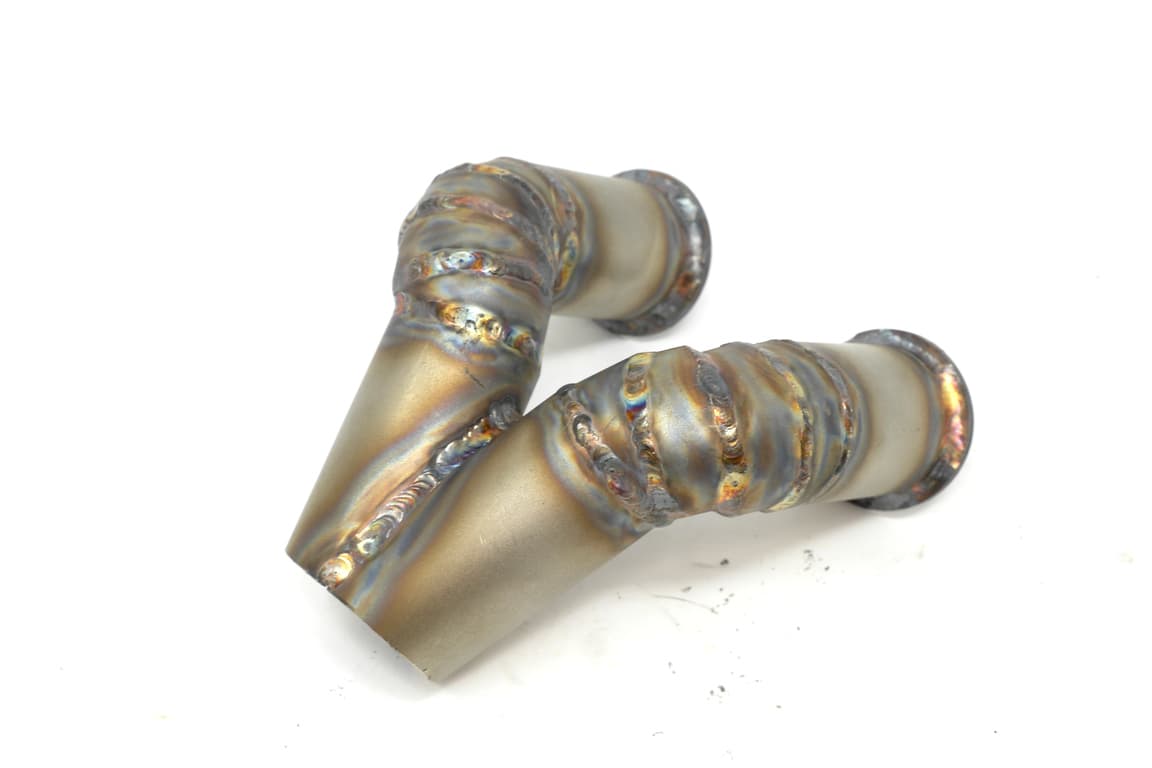 Welded exhaust manifold for turbocharged motorcycle