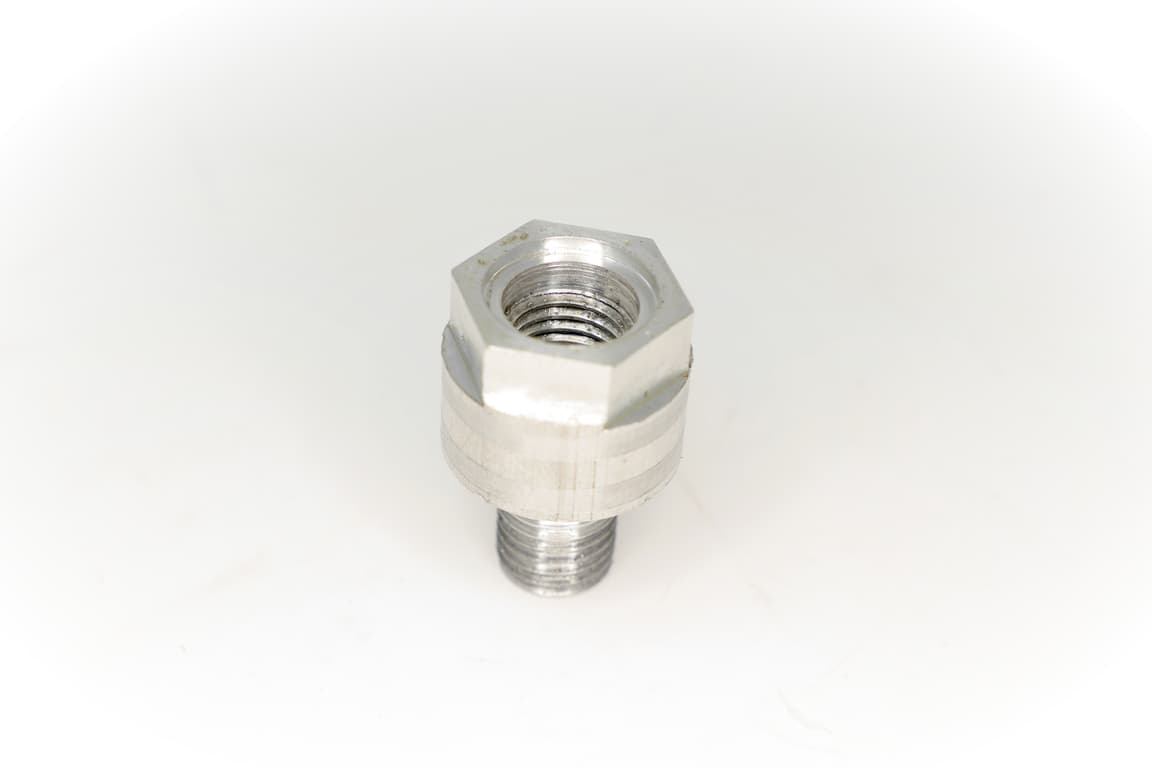 Machined aluminum bung for coolant sensor adaptor