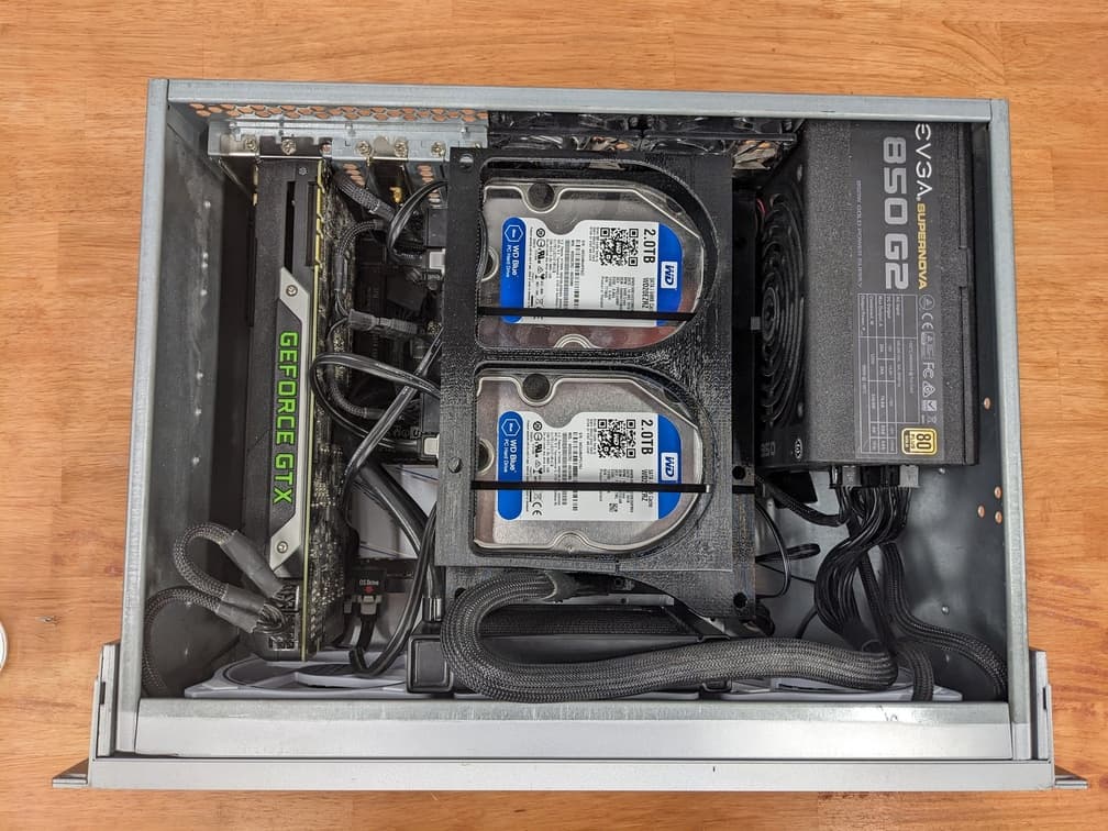 Installed HDD Caddy in ATX motherboard bolts