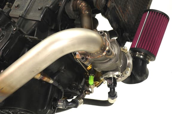 Welded oil drain bung and assembled turbo assembly kit for Ninja motorcycle